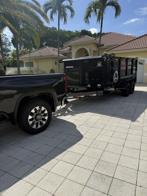 Dump trailer rental delivered by pickup truck in Hollywood Florida